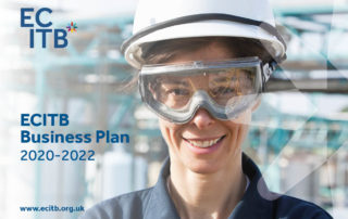 The cover of the ECITB's Business Plan 2020-2022 shows an site worker. She wears a white hard hat, goggle and a blue polo shirt.