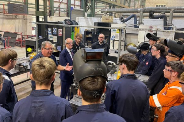 Andrew Hockey talking with ECITB scholars at the Engineering College in Birkenhead