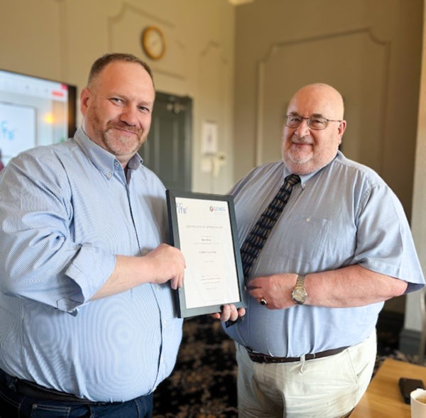 Dave Boden Hook (right) presents Mark Riley with a Certificate of Appreciation at his last CCNSG Committee meeting