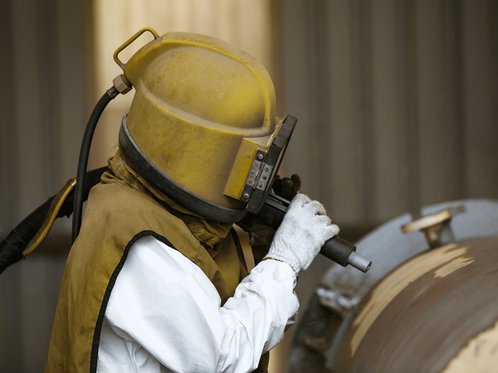 Fabric Maintenance  Surface Preparation By Sand Blasting