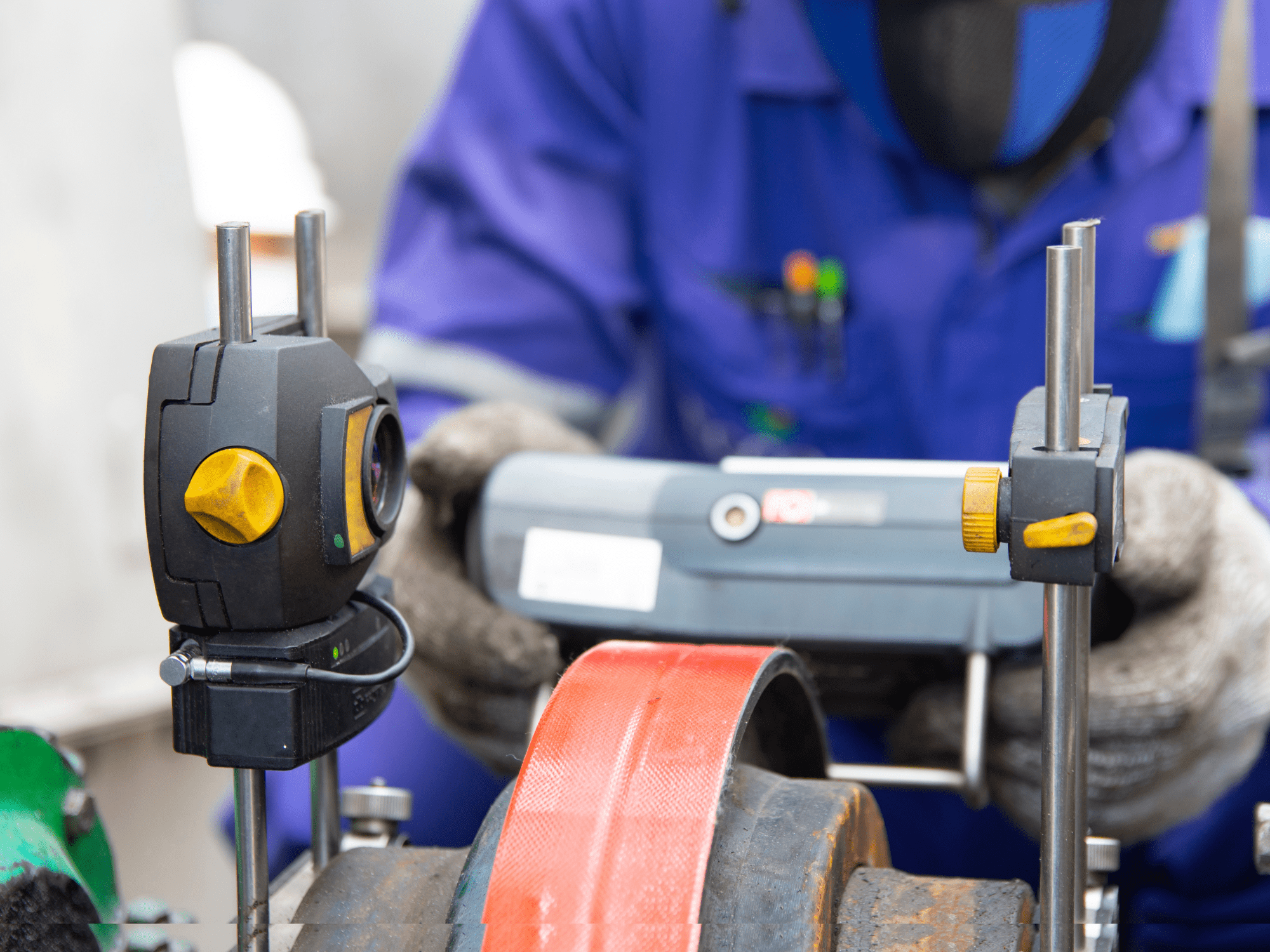 Mechanical Technician Aligning Shaft With Laser Shaft Alignment Tool.