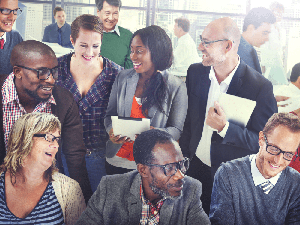 Group Of People Laughing In An Office 3