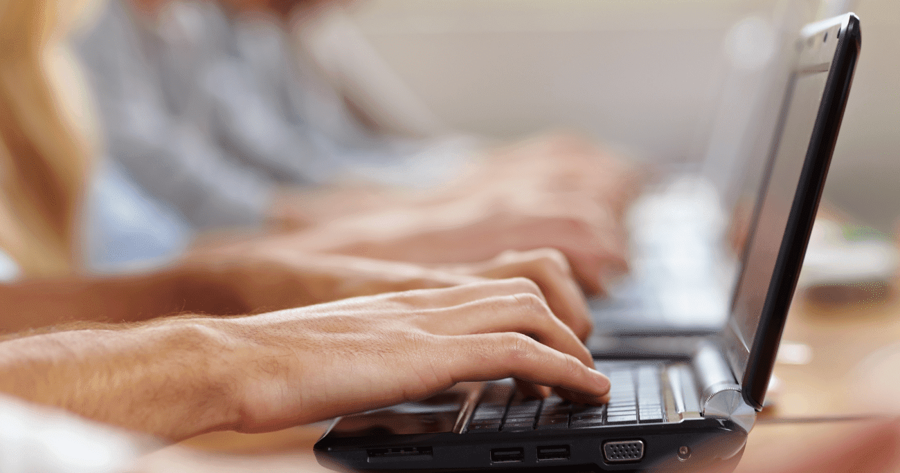 Man Working At A Black Laptop Aspect Ratio 760 400