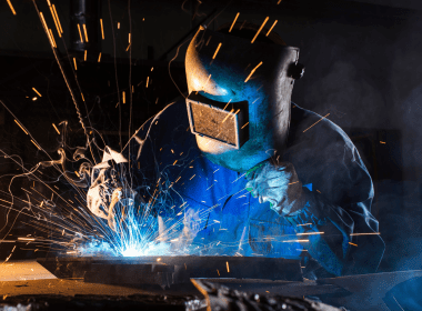 Welding Person In PPE Welding Up Close In A Dark Room Aspect Ratio 380 280