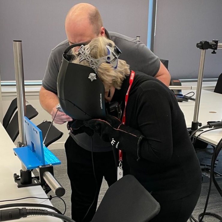 ECITB Board Chair Lynda Armstrong Using Simulator Equipment On A Site Tour Of Forth Valley College.