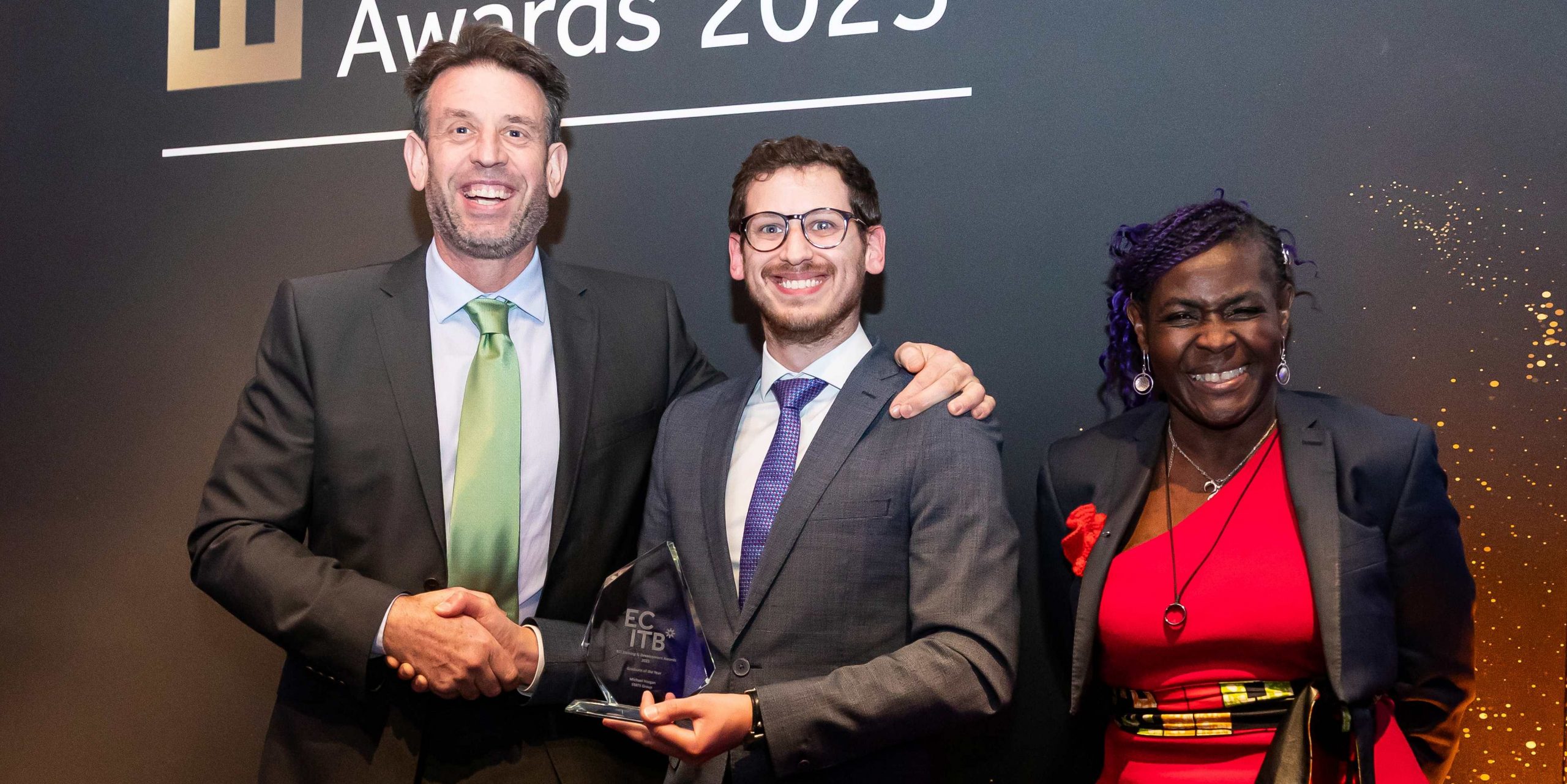 Andy Buckworth From STATS Group Picking Up The Graduate Award For His Employee Michael Horgan