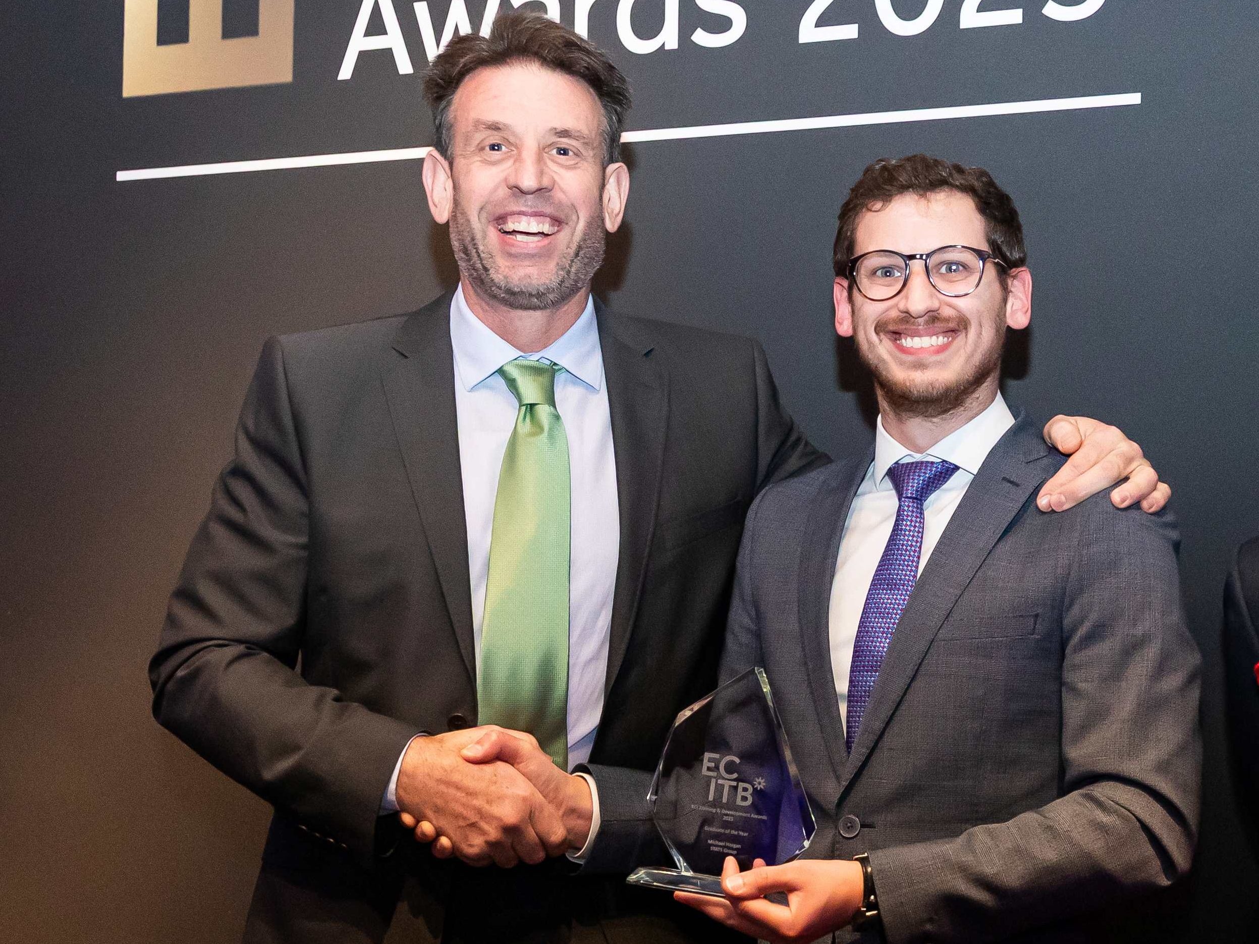 Andy Buckworth From STATS Group Picking Up The Graduate Award For His Employee Michael Horgan