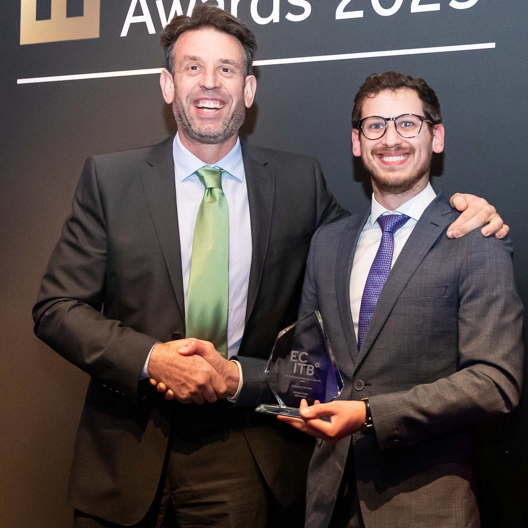 Andy Buckworth From STATS Group Picking Up The Graduate Award For His Employee Michael Horgan