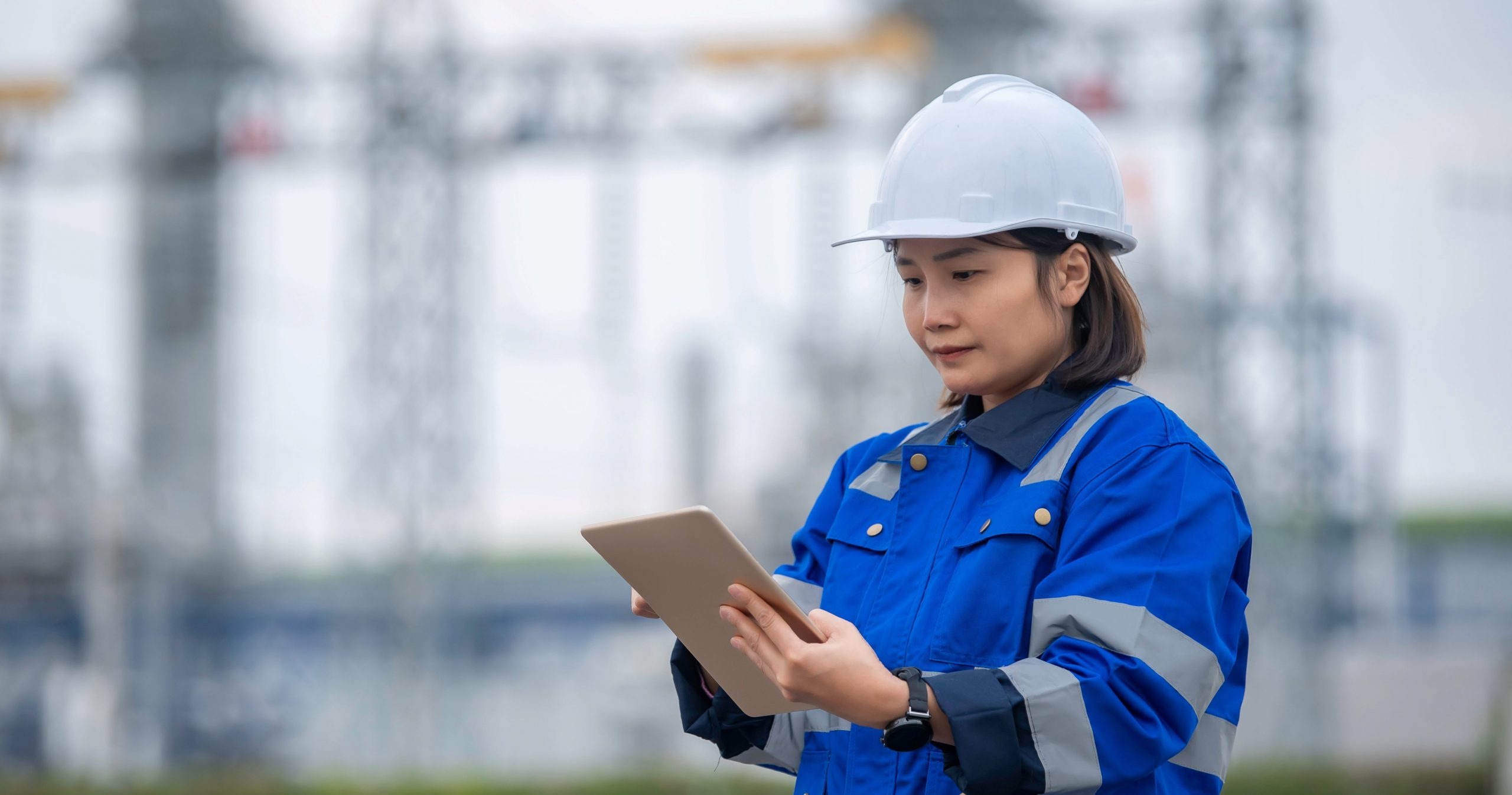 A Female Petrochemical Engineer Working At An Oil And Gas Refinery Plant
