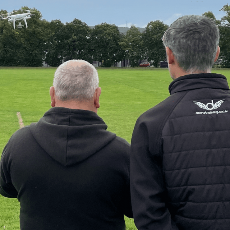 Julian Hoile With Global Drone Training Director Jonathan Carter Flying A Drone During The Course