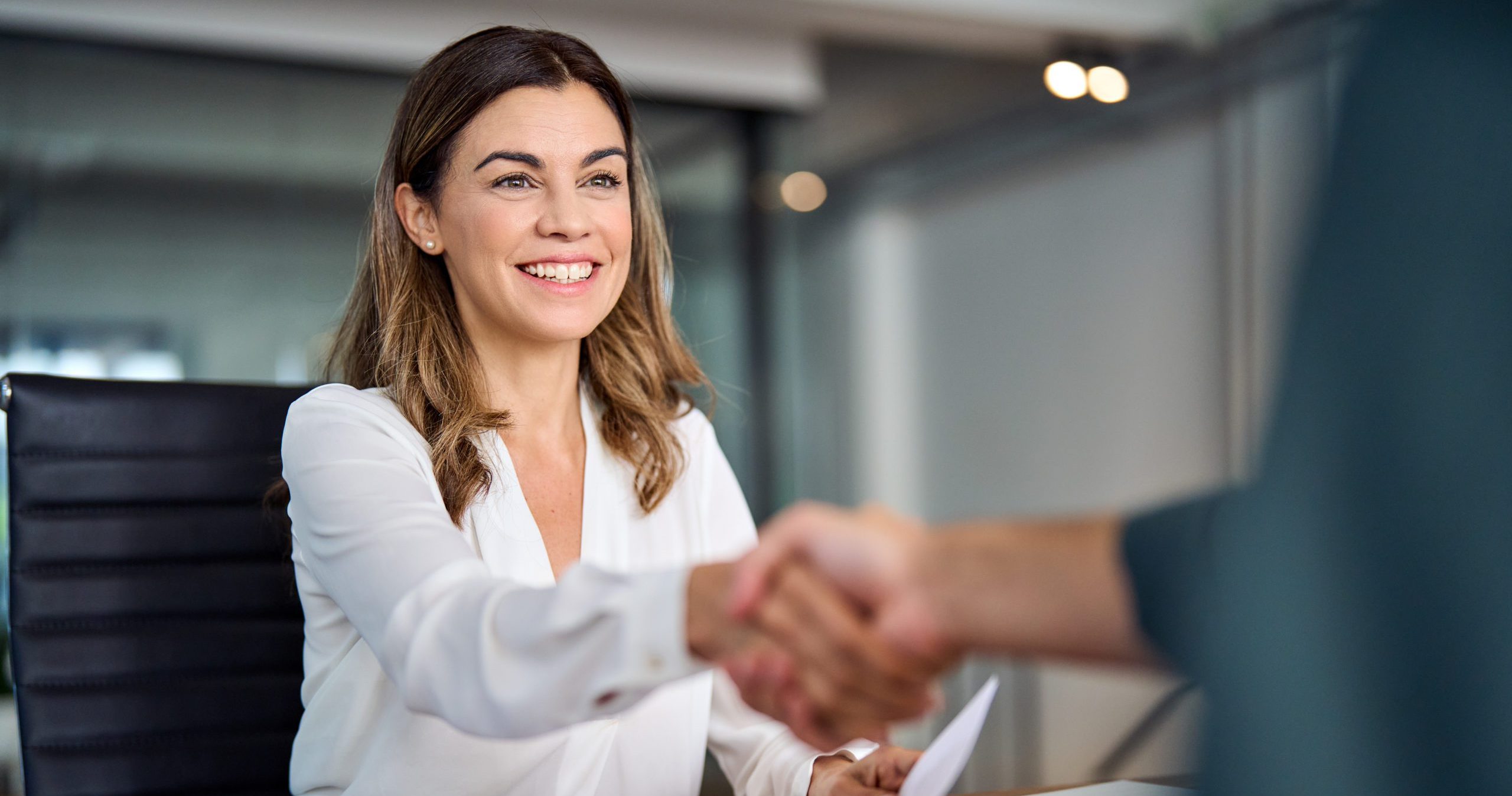 ECITB suppliers page - Business woman shaking hands