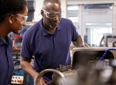 Scholar Working With Tutor Wearing Blue And Safety Glasses 2